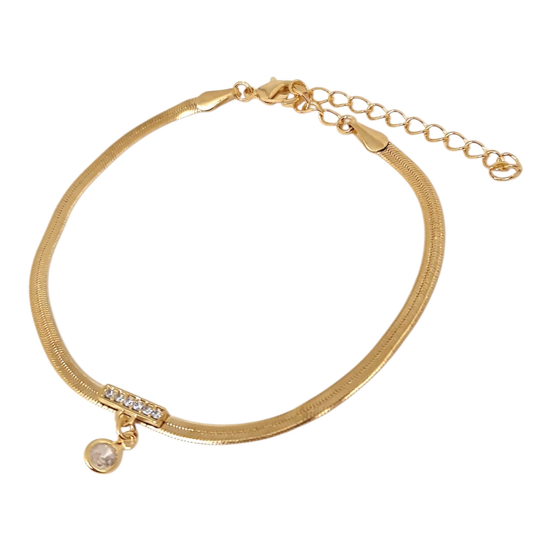 "Pulsera Punto de Luz Cinta Oro 18k con circón - Vista frontal"