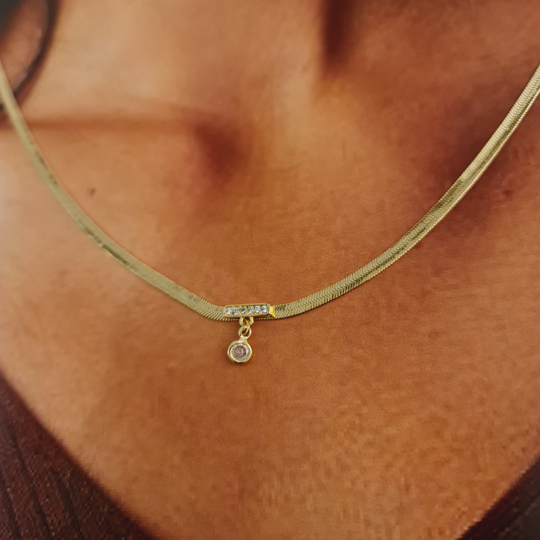 Collar Cinta Punto de Luz Oro