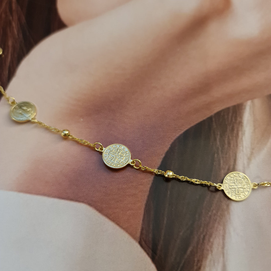 PULSERA SAN BENITO PELOTITAS ORO